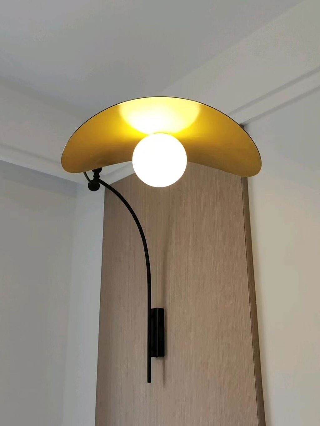 Customer photo review of Adjustable Arm Wall Light, Black Iron Wall Sconce, Plug In