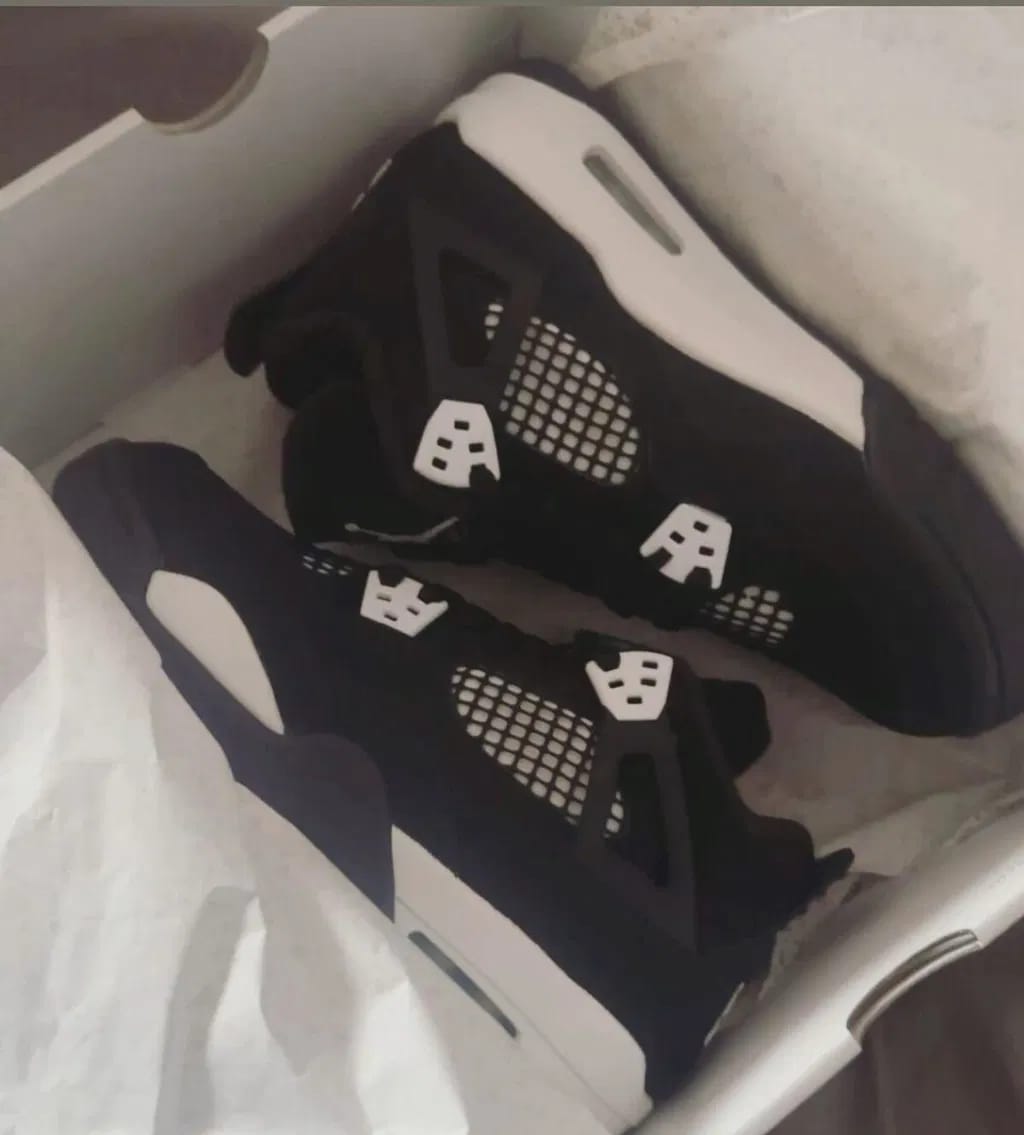 Customer photo review of Air Jordan 4 Retro “Thunder White”