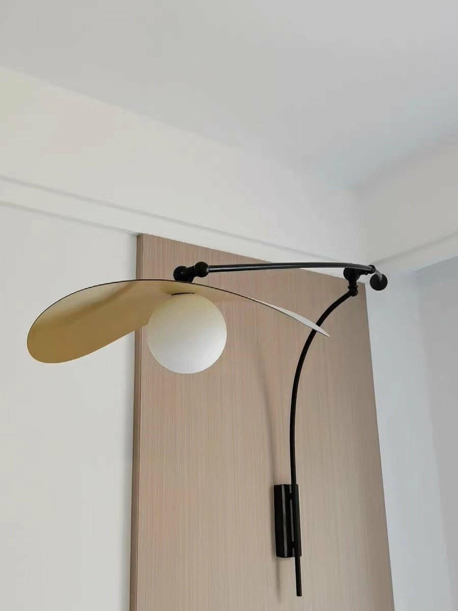 Customer photo review of Adjustable Arm Wall Light, Black Iron Wall Sconce, Plug In