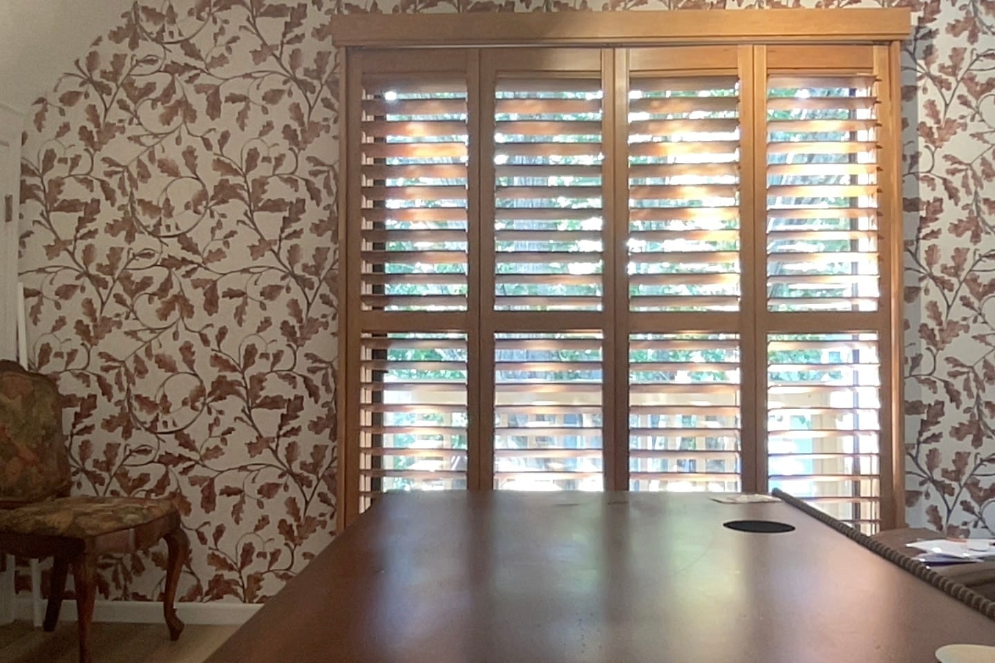 Customer photo review of Stained Wood Sliding Door Plantation Shutter