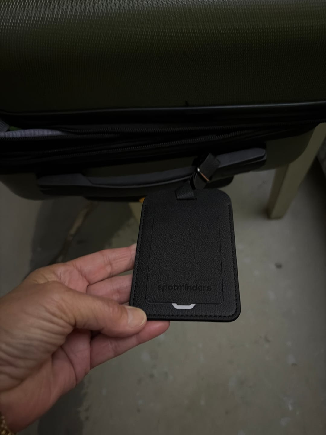 Customer photo review of Trackable Luggage Tag