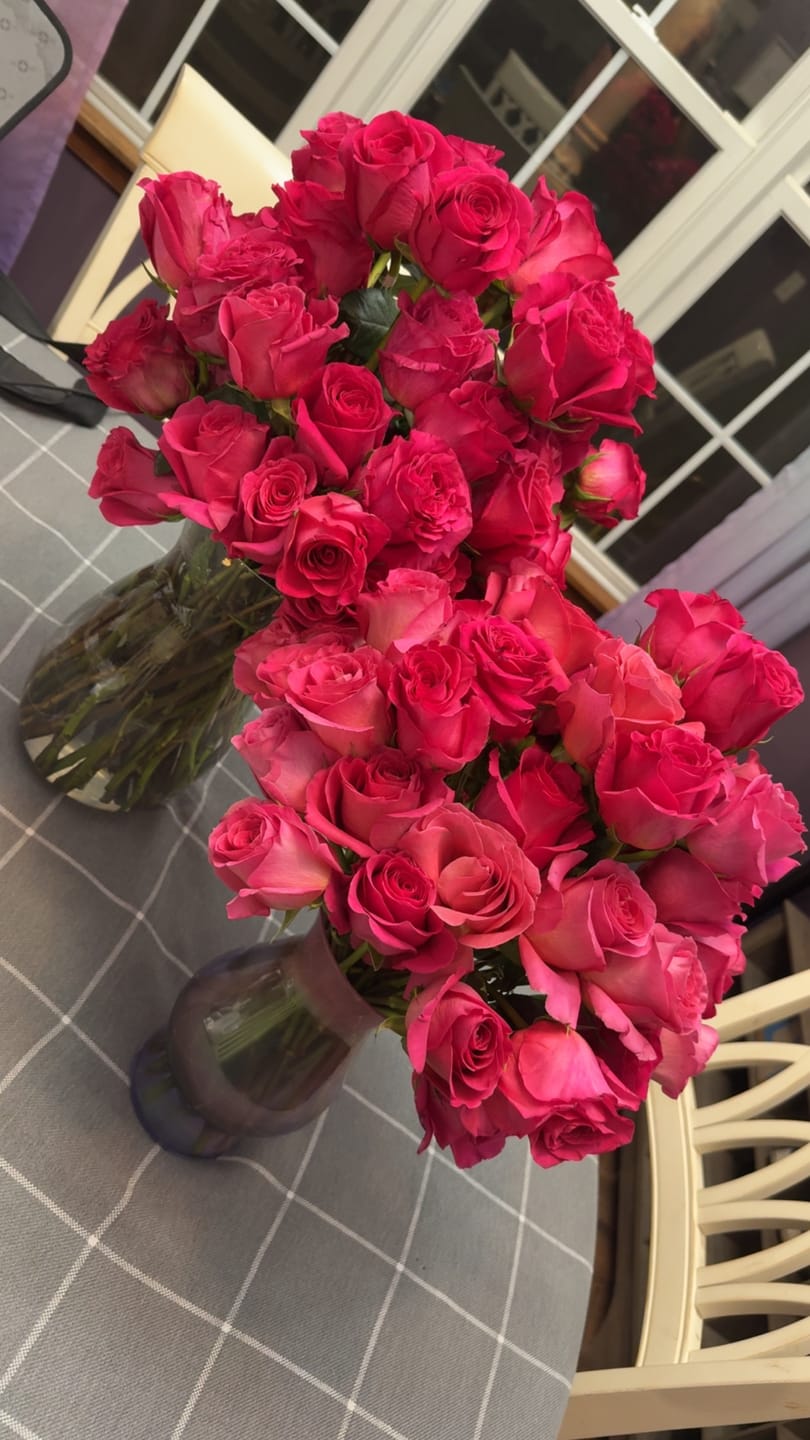 Customer photo review of 100 Hot Pink Roses
