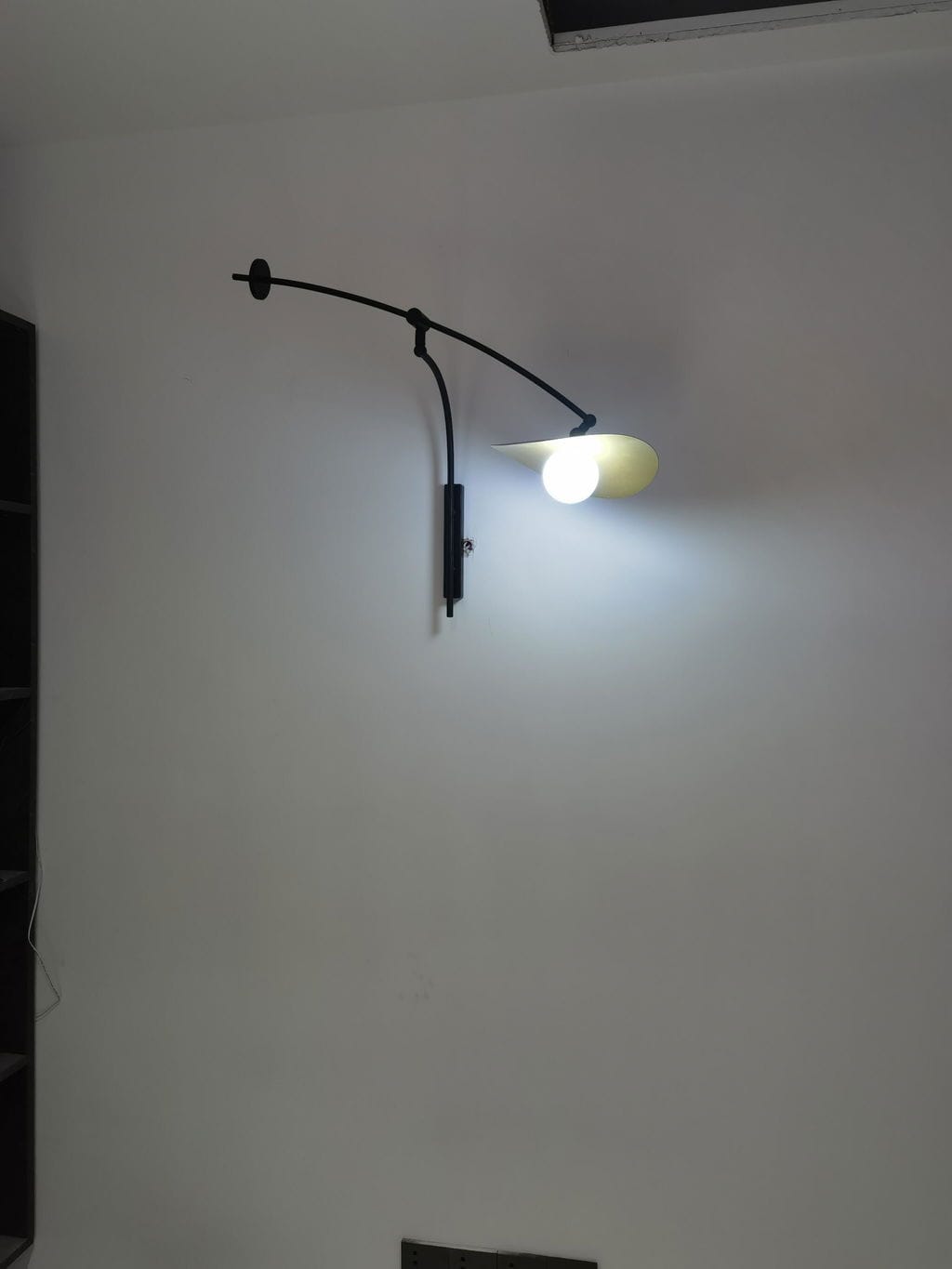 Customer photo review of Adjustable Arm Wall Light, Black Iron Wall Sconce, Plug In