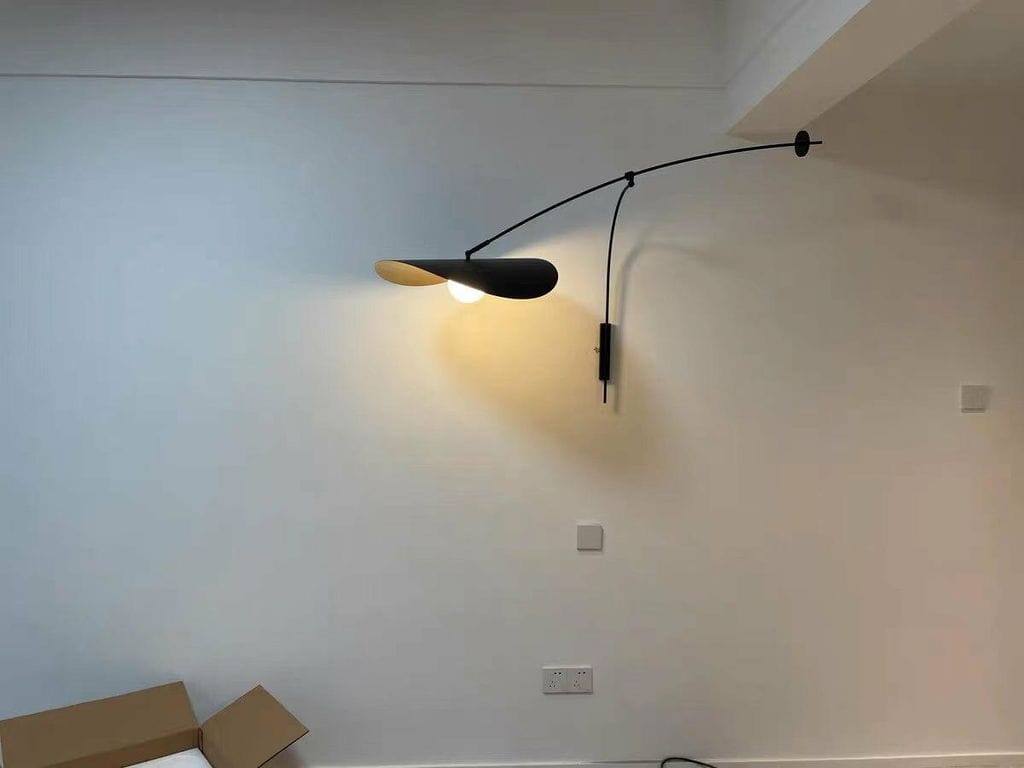 Customer photo review of Adjustable Arm Wall Light, Black Iron Wall Sconce, Plug In