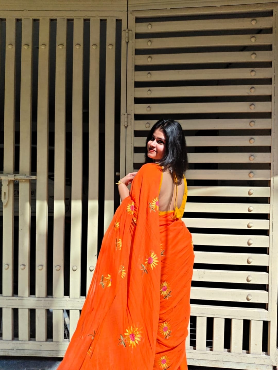 Customer photo review of Orange Sunflower Mulmul Cotton Saree