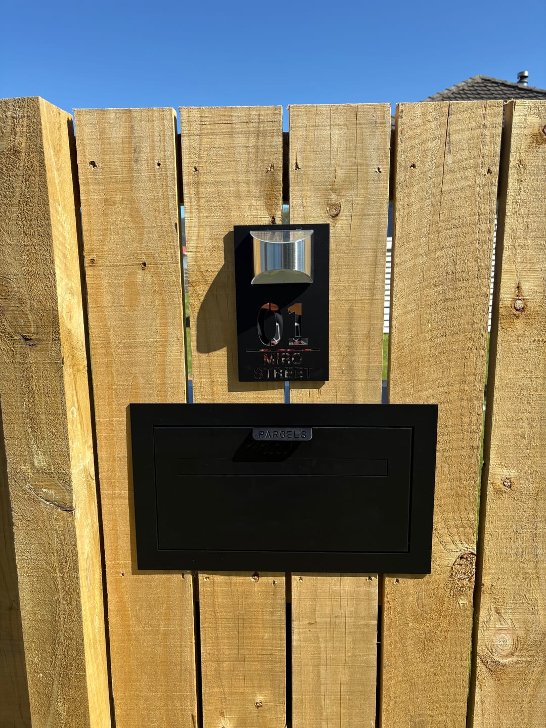 Customer photo review of WhareLite™ | Personalized Address Plaque