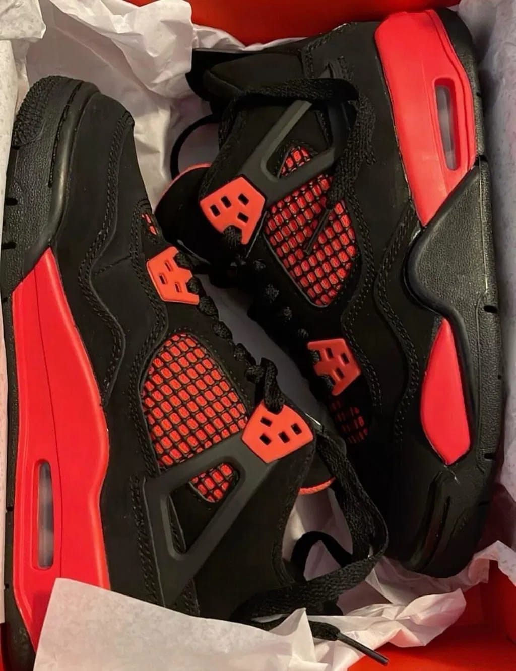Customer photo review of JORDAN 4 RETRO “RED THUNDER”