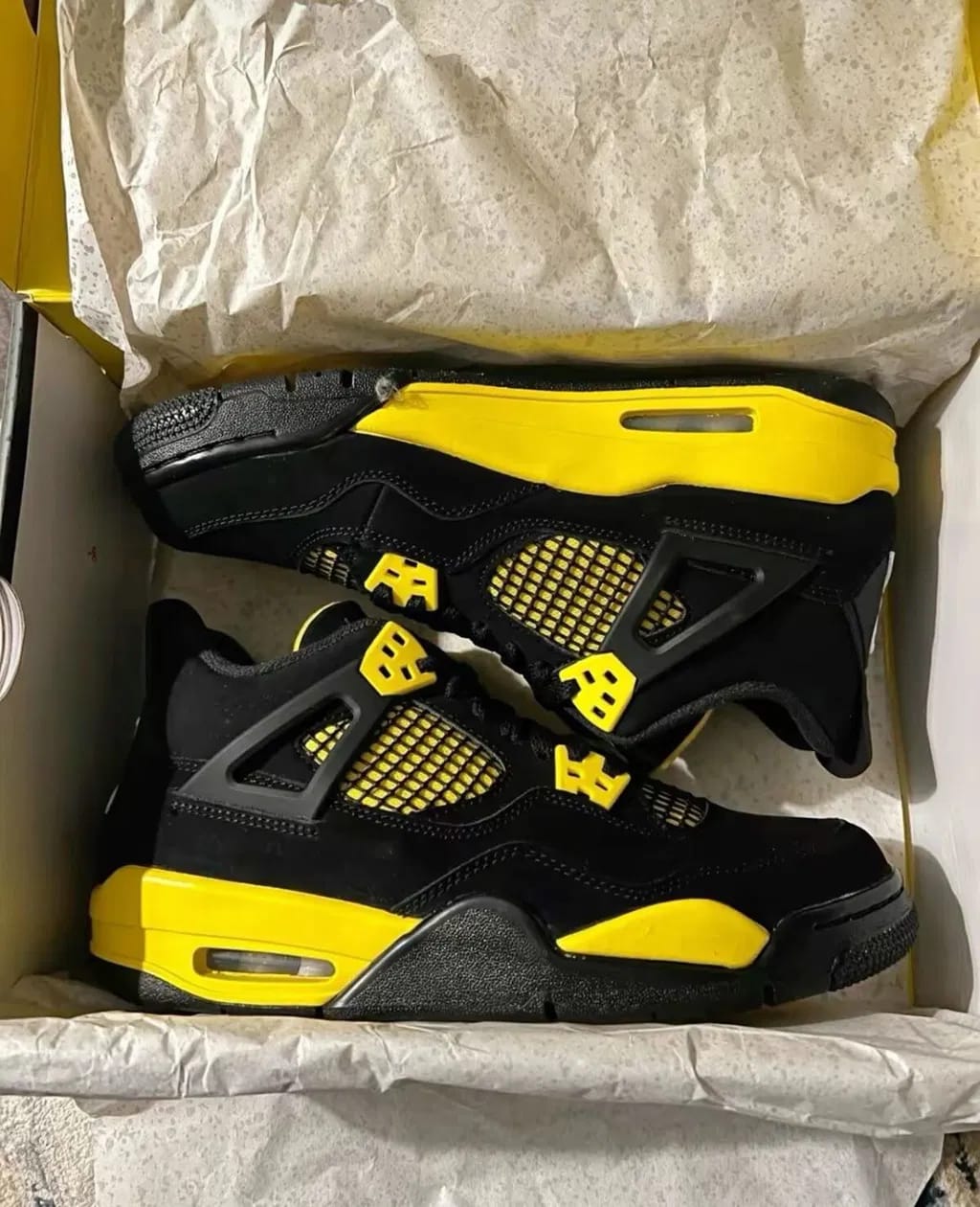 Customer photo review of Air Jordan 4 Retro “Thunder”