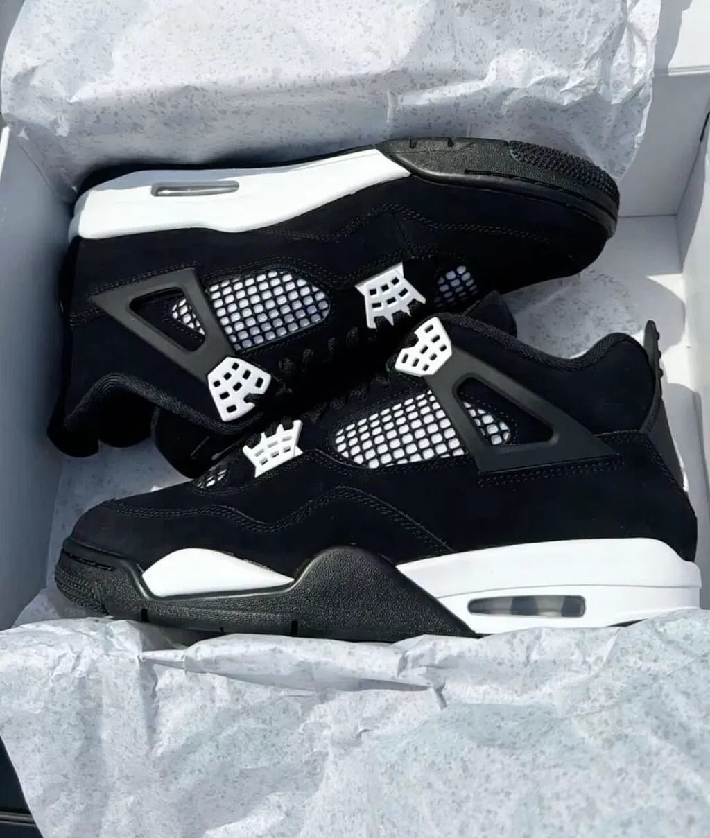 Customer photo review of Air Jordan 4 Retro “Thunder White”