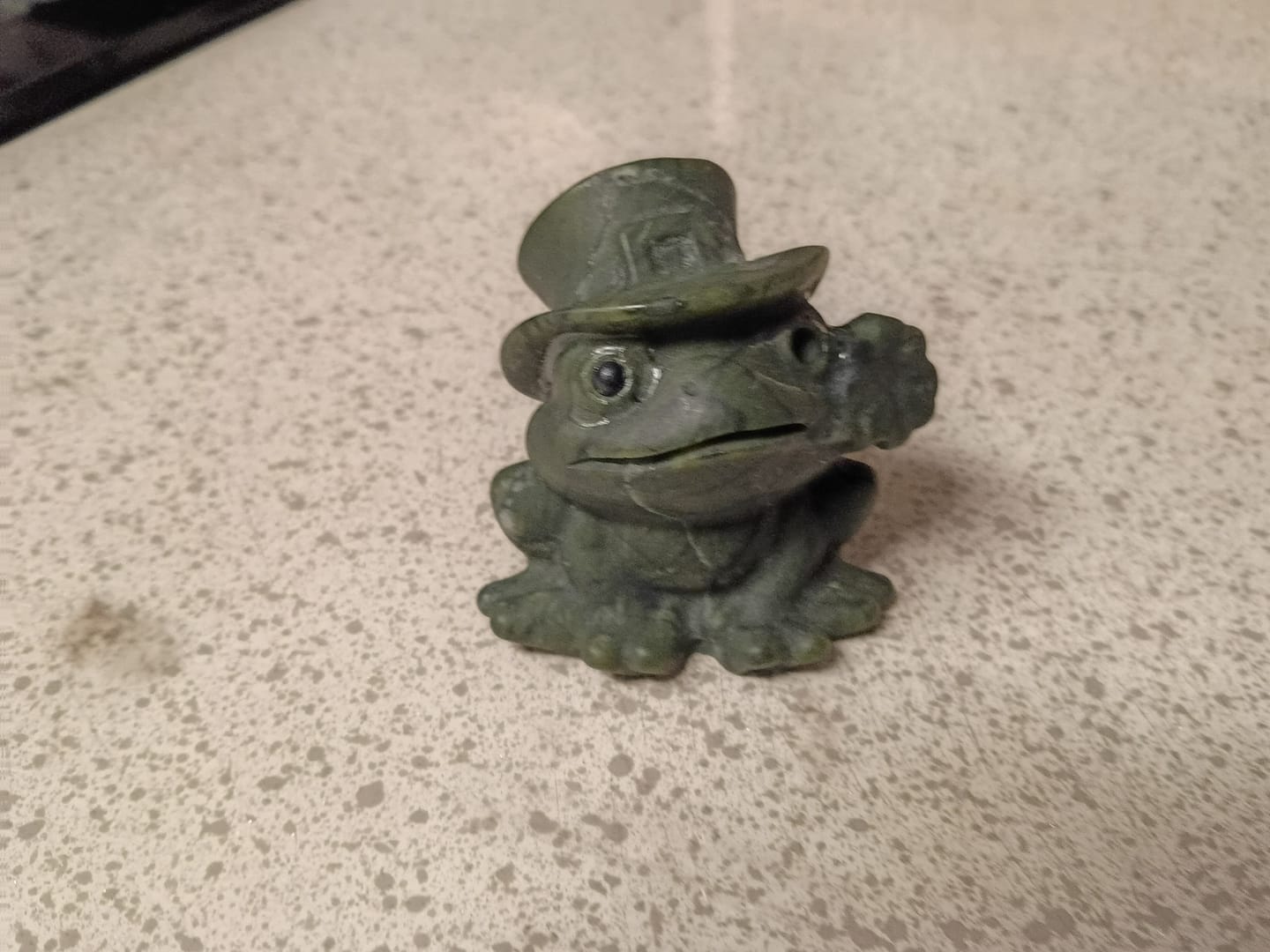Customer photo review of A Slightly Imperfect Natural Crystal Serpentine Frog With Flower Carving