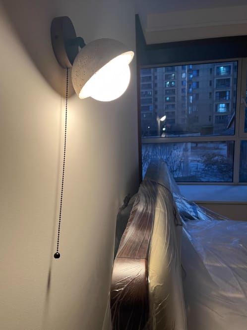Customer photo review of Travertine Dome Wall Light, Wood Backplate, Pull Chain, Wall Sconce