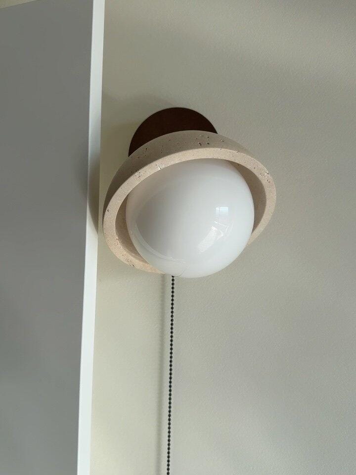 Customer photo review of Travertine Dome Wall Light, Wood Backplate, Pull Chain, Wall Sconce
