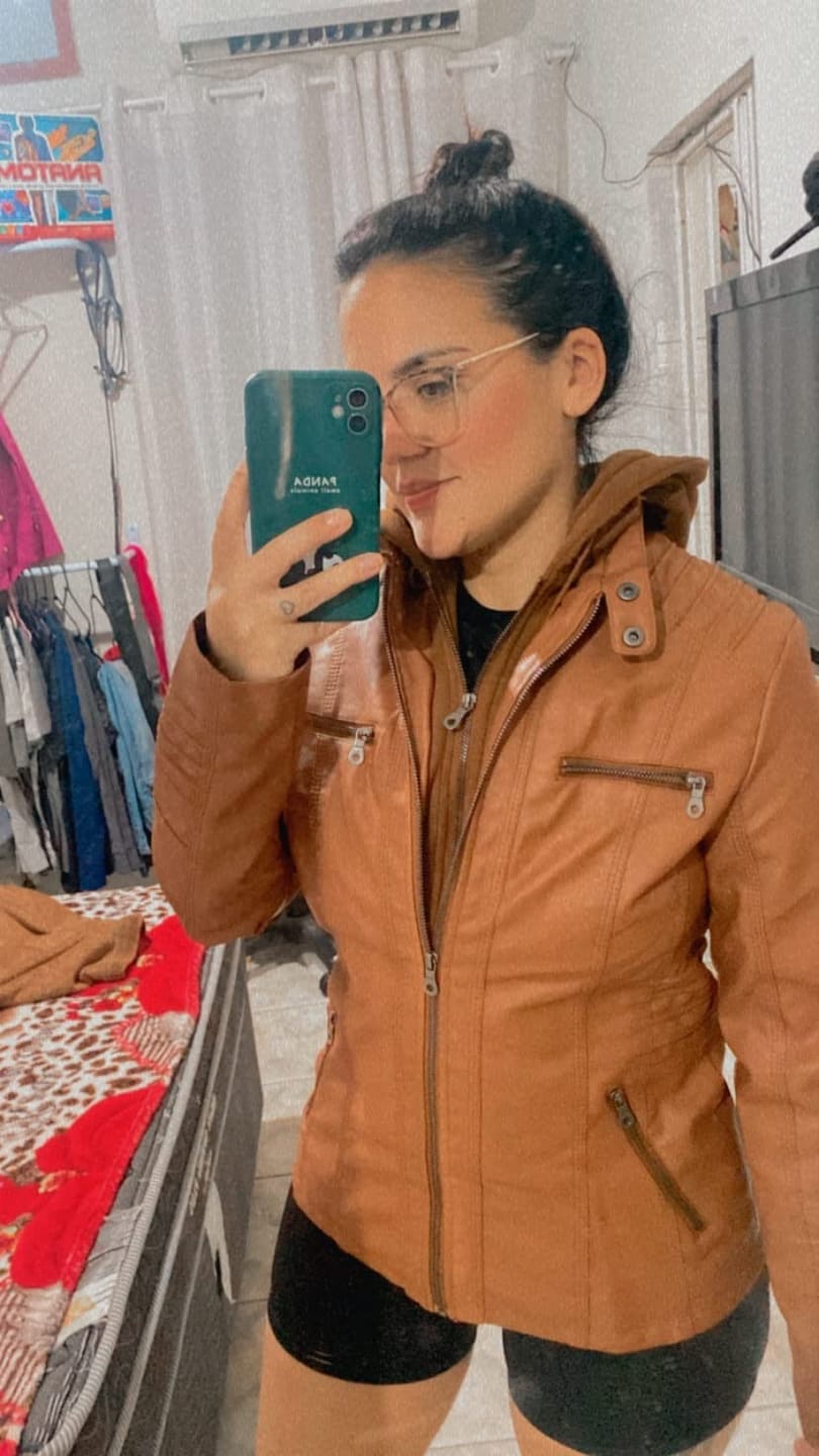 Customer photo review of Women's Faux Leather Jacket with Detachable Hood Motorcycle Biker Jacket Full Zipper Pleated Casual Warm Jacket