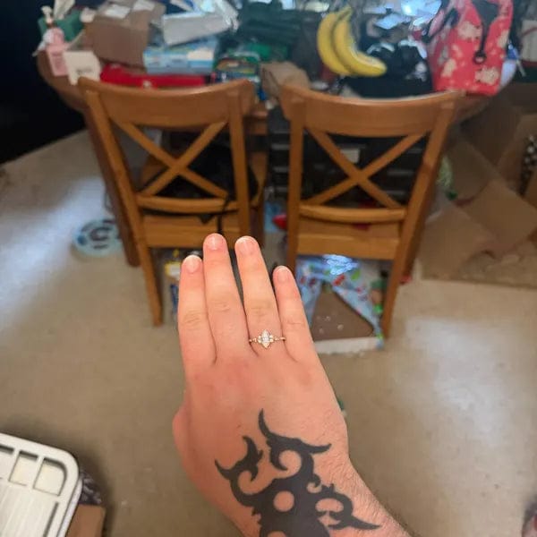 Customer photo review of 2.5 CT Marquise Cut Lab Grown Diamond Three Stone Engagement Ring