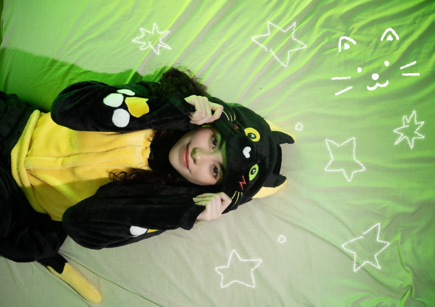 Customer photo review of OLAOLA Star Black Cat Costume Unisex Adult Plush Animals Onesie Pajamas Warm Home Pet One-Piece Sleepwear