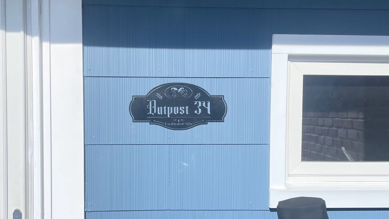 Customer photo review of Pub Metal Sign
