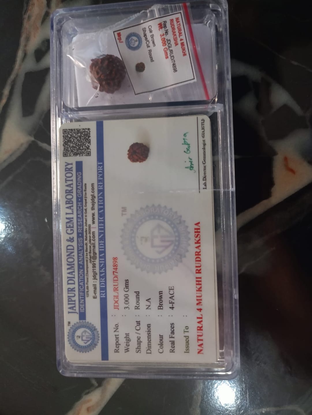 Customer photo review of Nepal Origin 4 Mukhi Rudraksha – 100% Natural & Certified