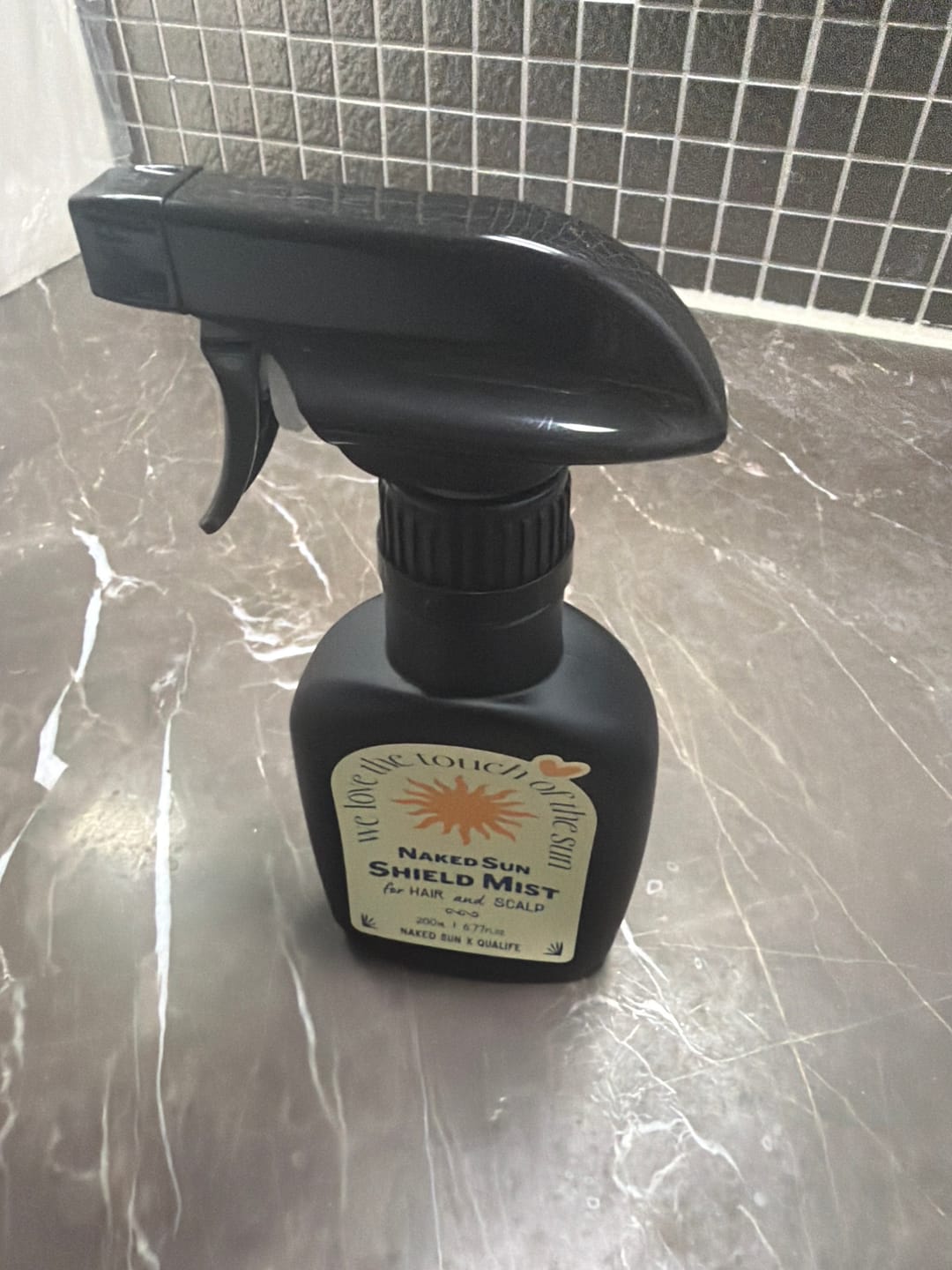 Customer photo review of Naked Sun Shield Mist for Hair and Scalp 200ml