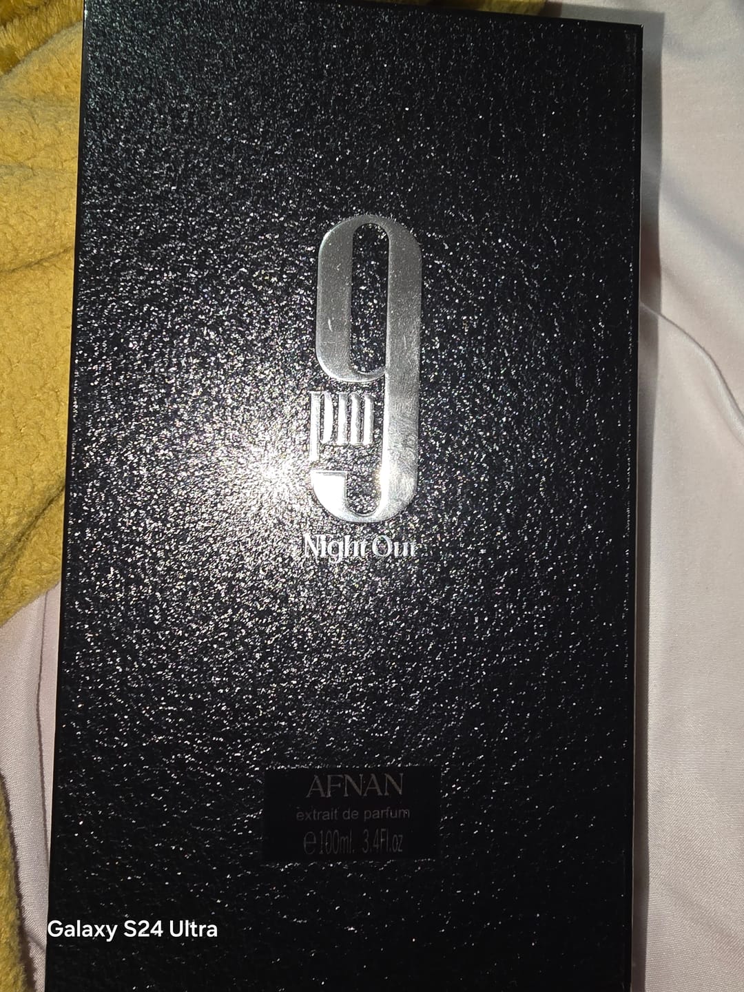 Customer photo review of Afnan 9PM Night Out Unisex Extrait de Parfum