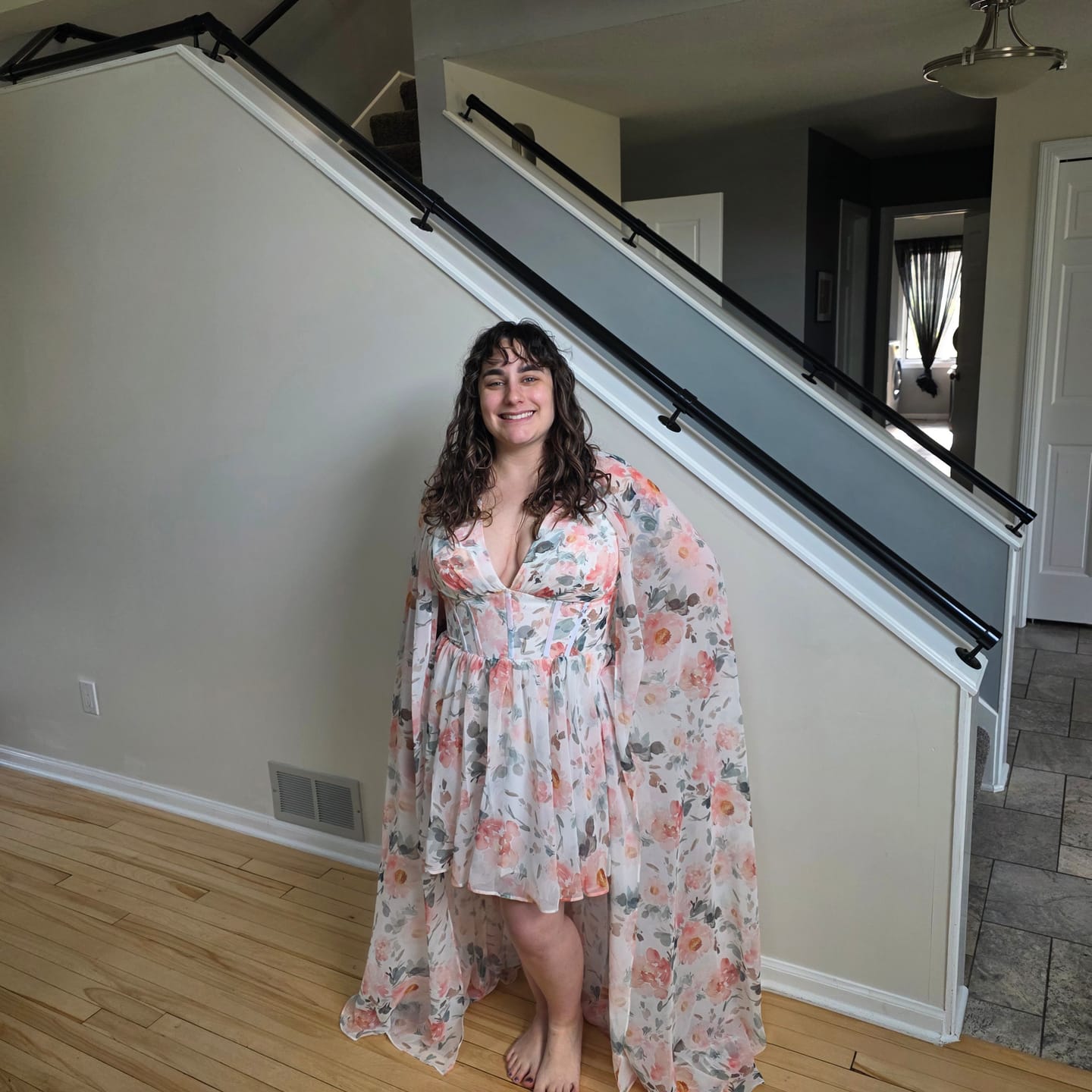 Customer photo review of Floral Chiffon V-Neck Corset Gown with Flowing Cape Sleeves