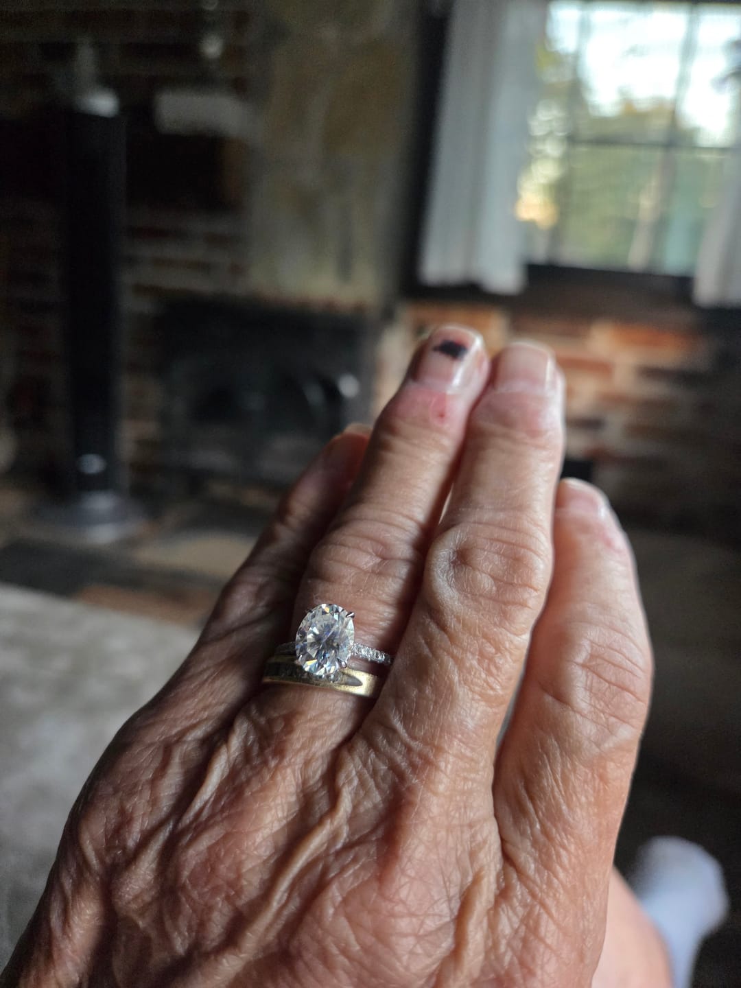 Customer photo review of Oval-Cut Moissanite Hidden Halo Ring with Pavé Band