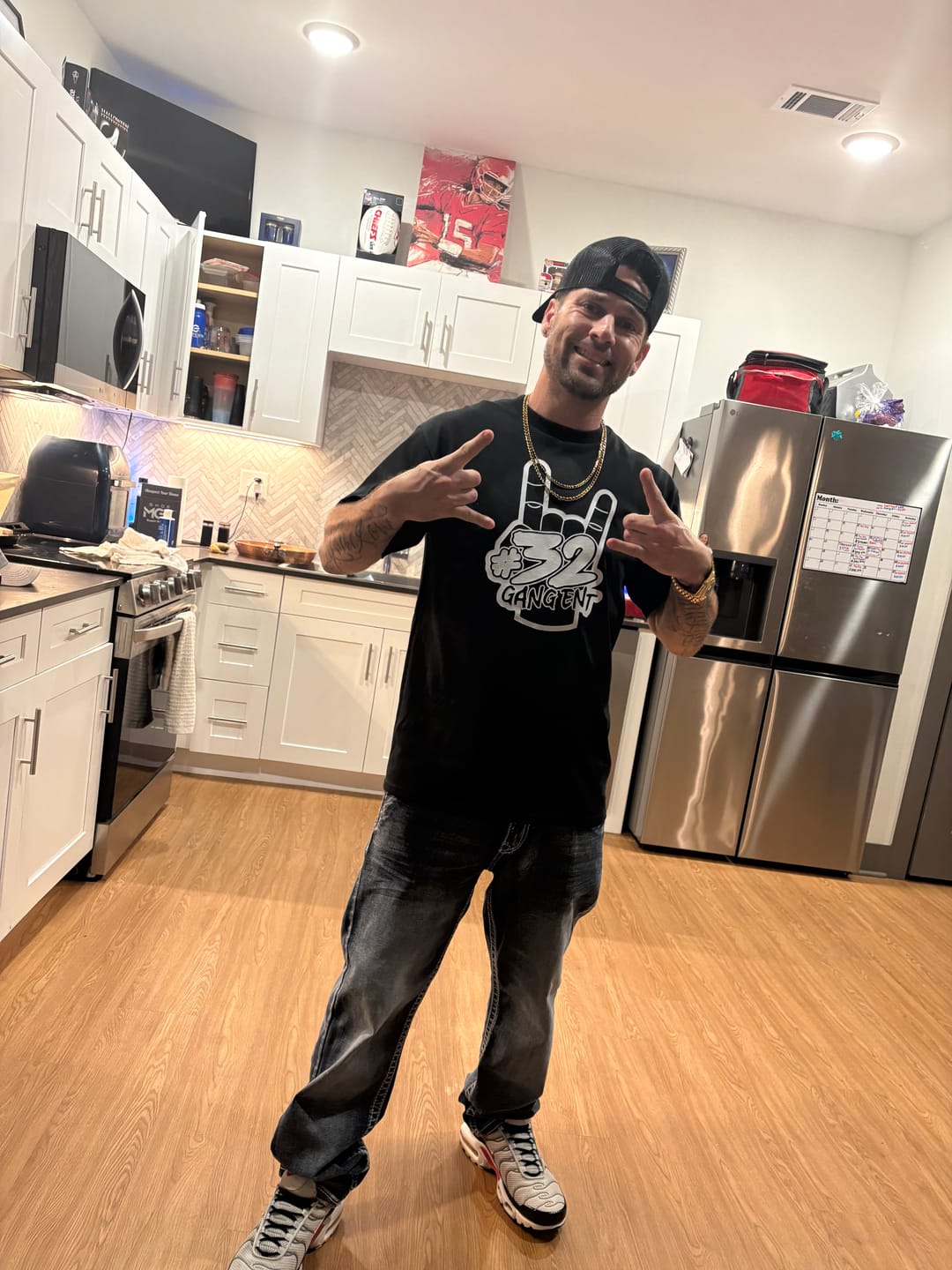 Customer photo review of 32 GANG BUDGET TEE