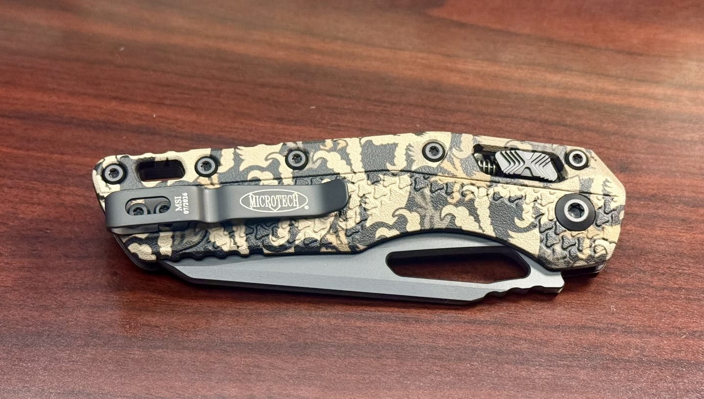 Customer photo review of Microtech MSI Ram-Lok Knife – 3.75" M390MK, Claw Burst Camo Polymer – Made in USA (210T-1PMCWC-Z4)