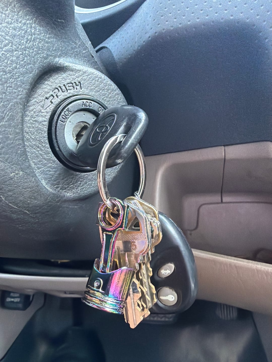 Customer photo review of Piston Keychain