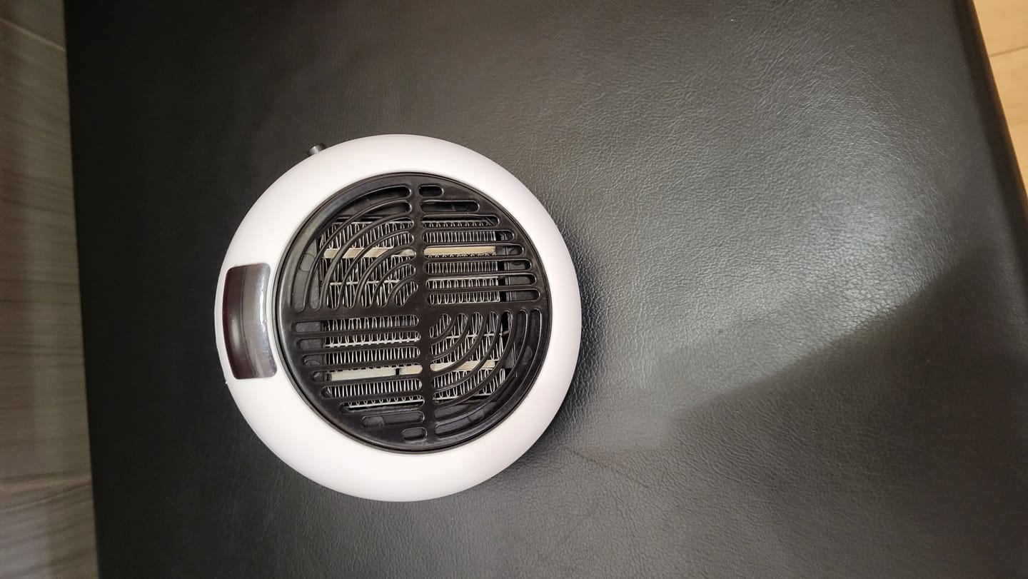 Customer photo review of Calefactor Personal Portátil