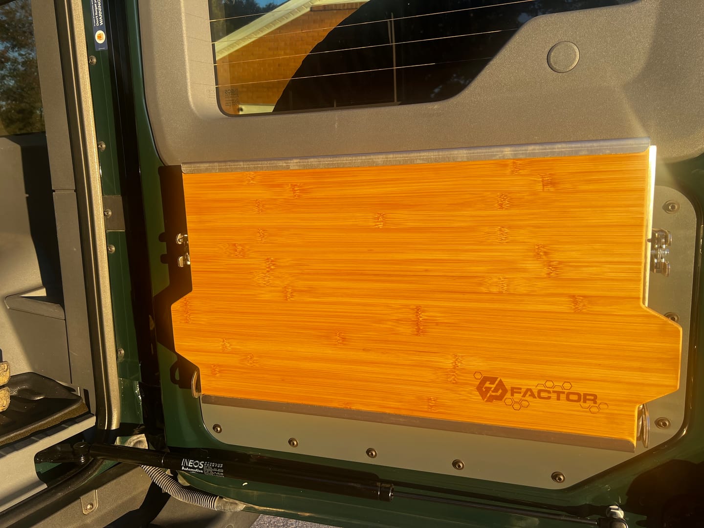 Customer photo review of Ineos Grenadier V2 Folding Tailgate Table with Extended Storage Cubby
