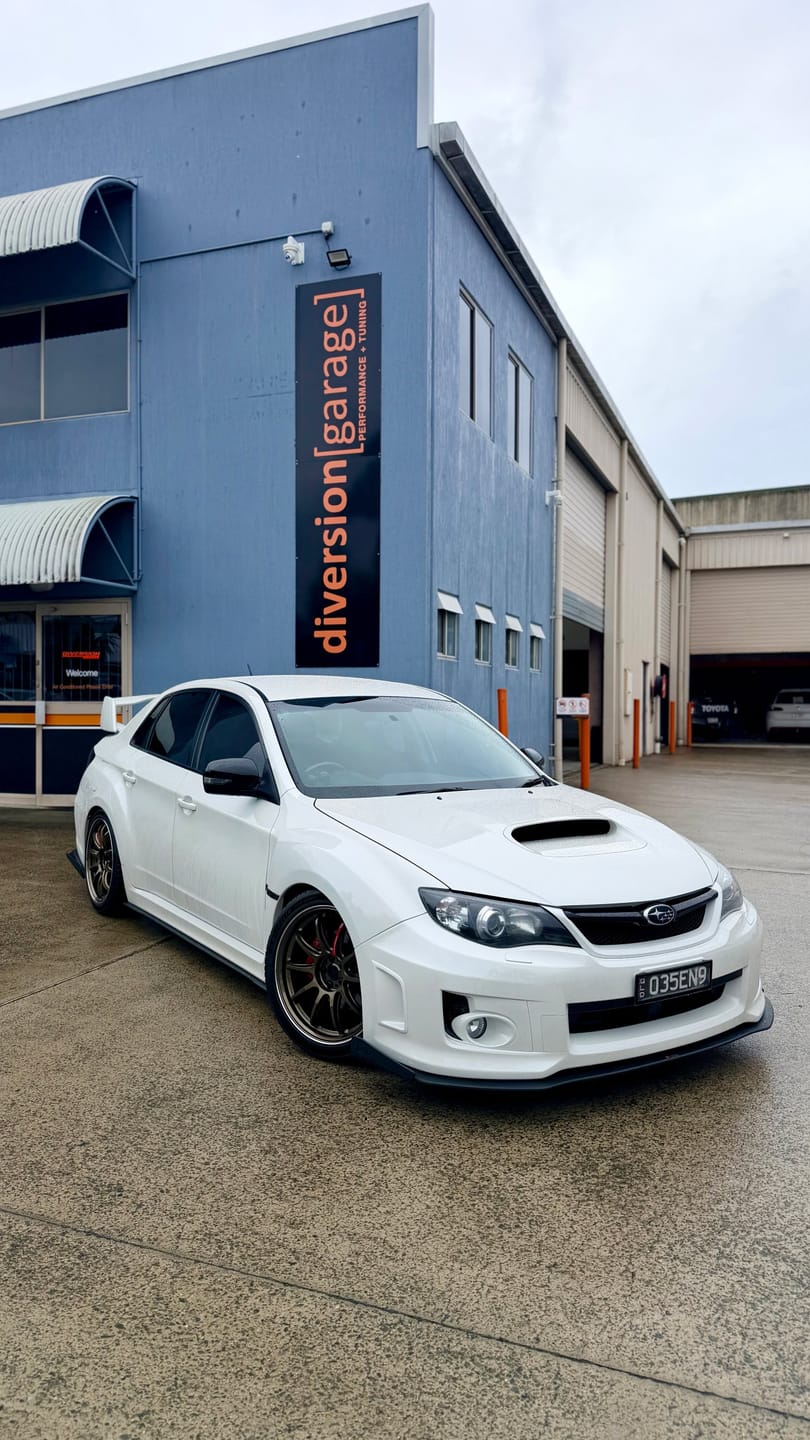Customer photo review of Impreza WRX / STI G3 Sedan FL Side Skirt Splitters (Pair)
