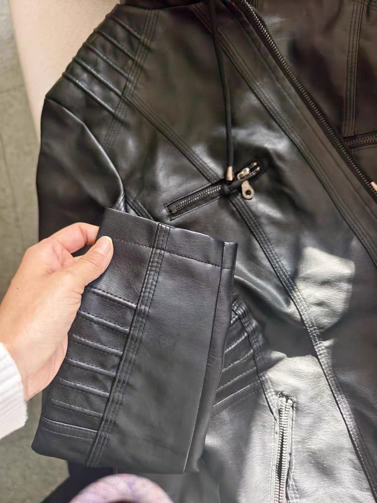 Customer photo review of Women's Faux Leather Jacket with Detachable Hood Motorcycle Biker Jacket Full Zipper Pleated Casual Warm Jacket