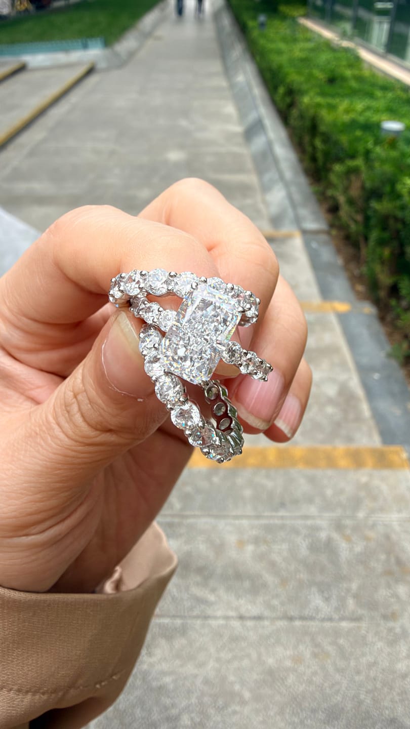 Customer photo review of 3PC 4.0Ct Radiant Cut Engagement Ring & Round Cut Eternity Wedding Bands
