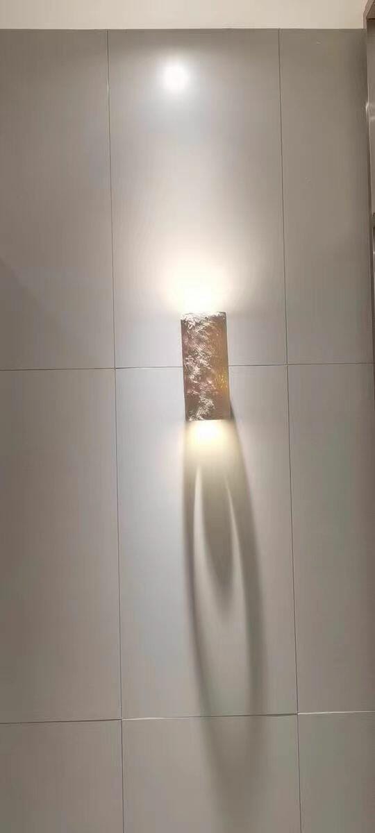 Customer photo review of Up and Down Travertine Wall Light, Cylinder, Wall Sconce