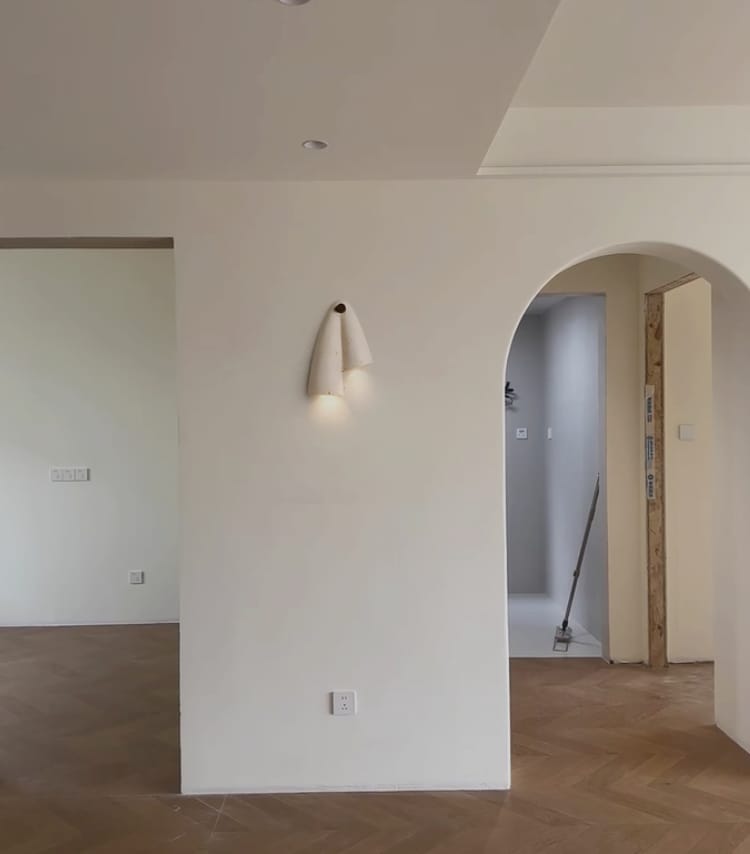 Customer photo review of Draped Travertine Wall Light, Wall Sconce, Wood Accent