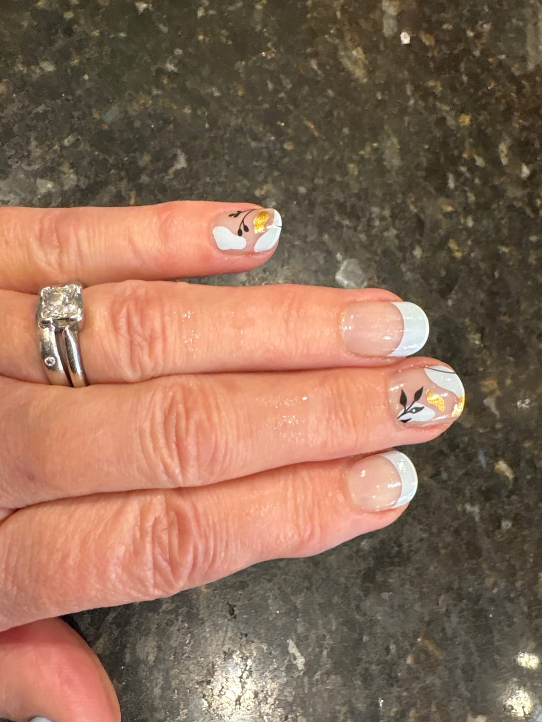 Customer photo review of Blue Floral Daze DIY Semicured Gel Nail Sticker Kit