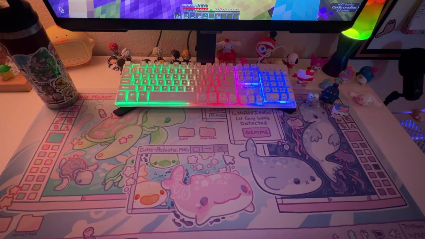 Customer photo review of Virtual Sea Pet Desk Mat!