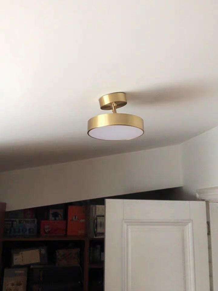 Customer photo review of Brass Ceiling Light, Head Rotates 45°, Integrated LED