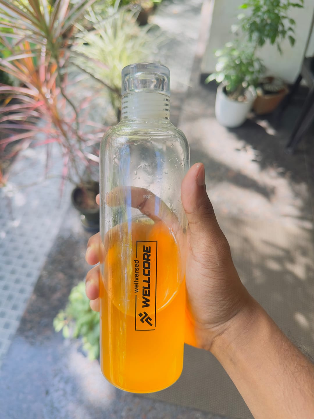 Customer photo review of Wellcore - Micronised Creatine Monohydrate (83 Servings, Tropical Tango) + Premium Glass Bottle