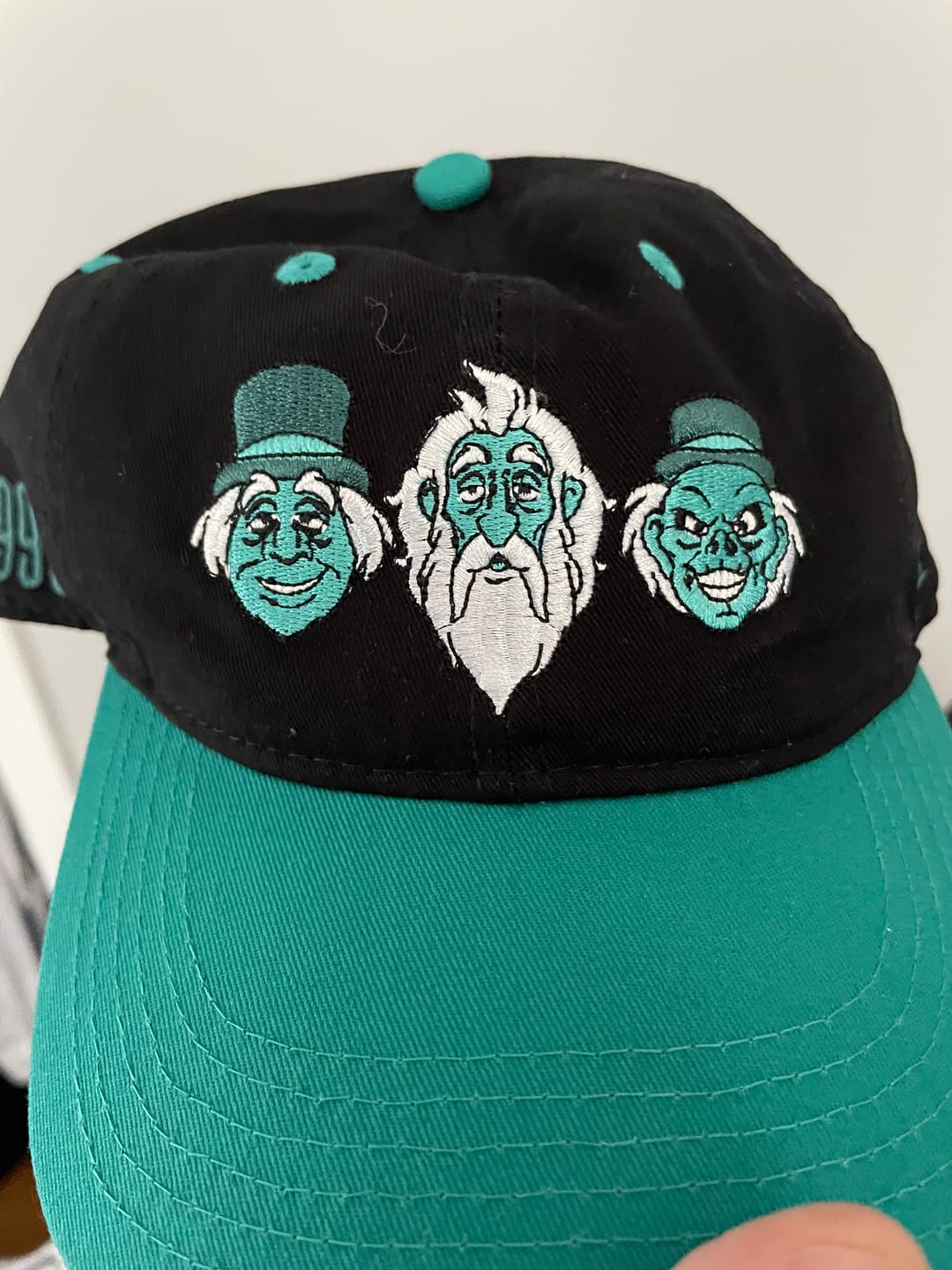 Customer photo review of Disney's Haunted Mansion "Hitching a Ride" – Dad Hat