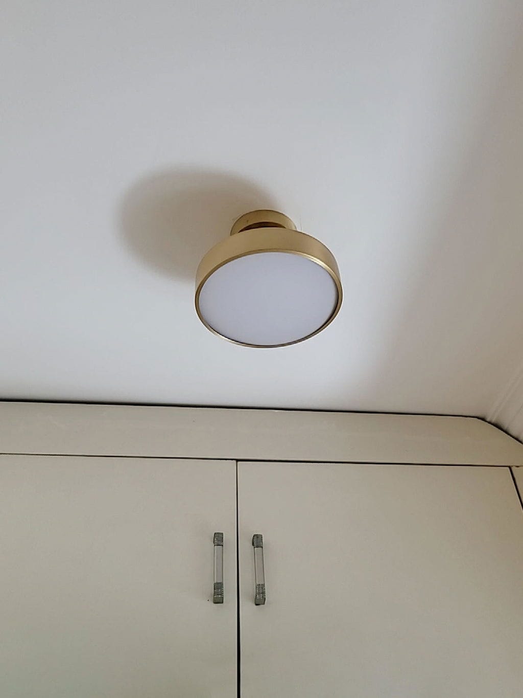 Customer photo review of Brass Ceiling Light, Head Rotates 45°, Integrated LED