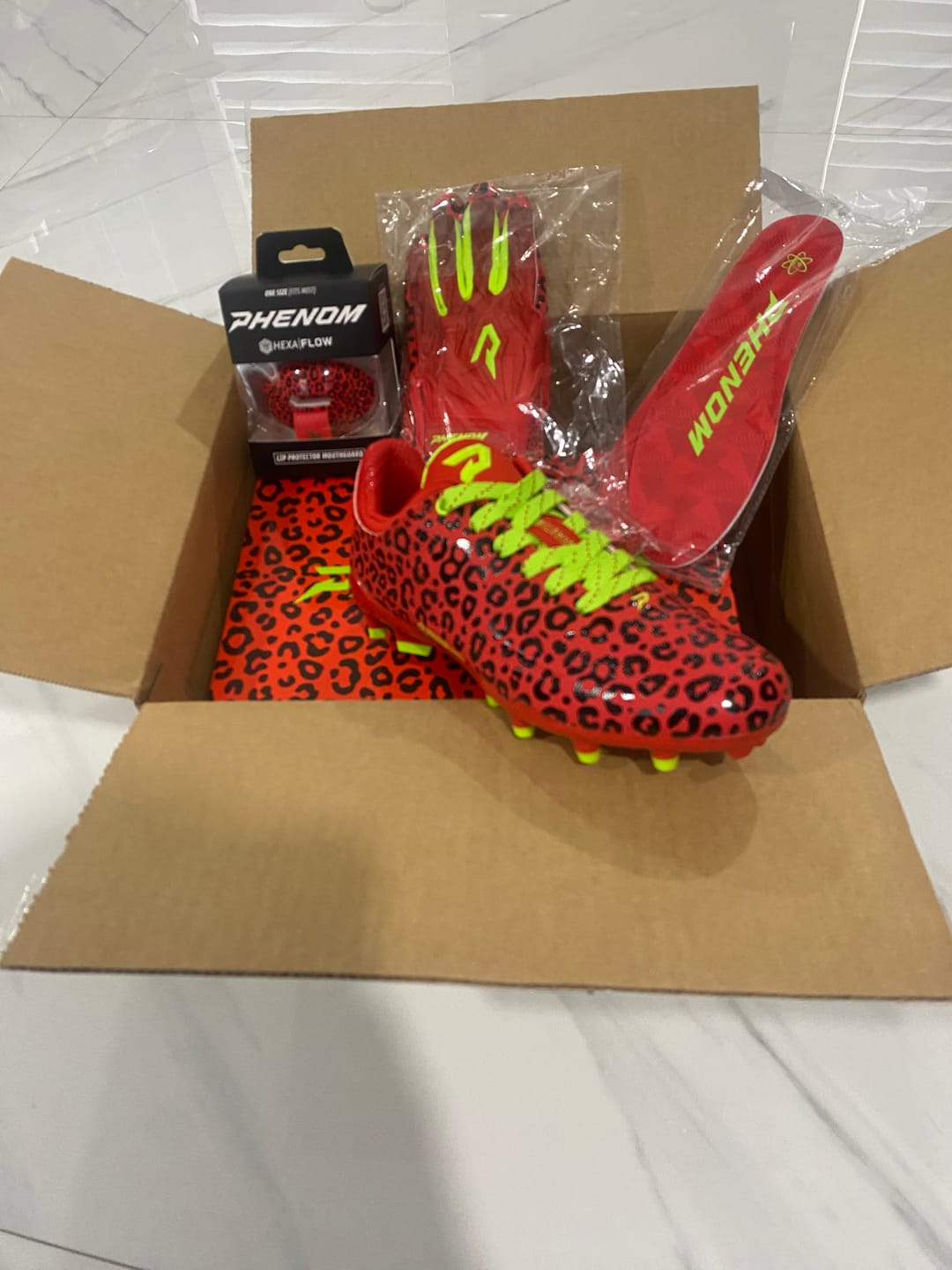 Customer photo review of Phenom Elite Quantum Fierce Youth & Adult Padded Football Gloves - Red Leopard