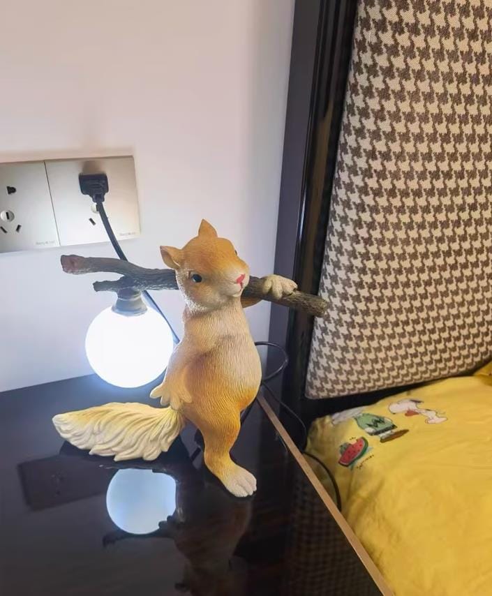 Customer photo review of Table Lamp, Cast Resin Squirrel Holding Glass Globe, 25 cm