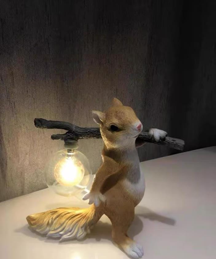 Customer photo review of Table Lamp, Cast Resin Squirrel Holding Glass Globe, 25 cm