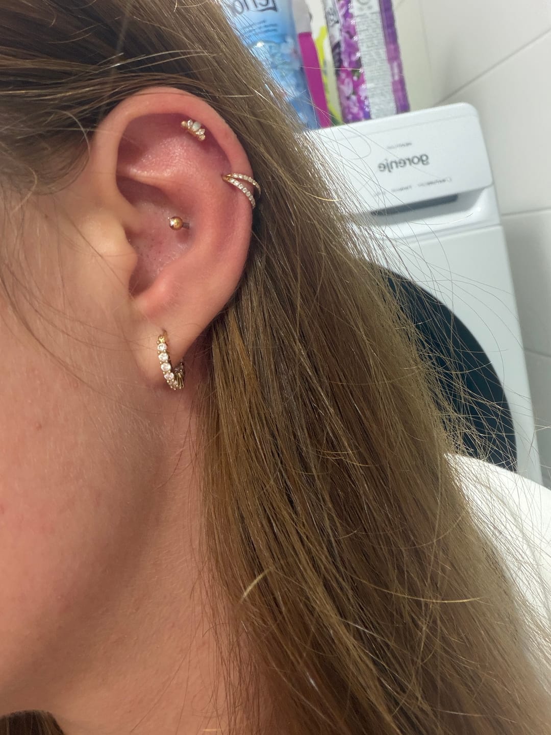 Customer photo review of Double Clicker Piercing | Titan