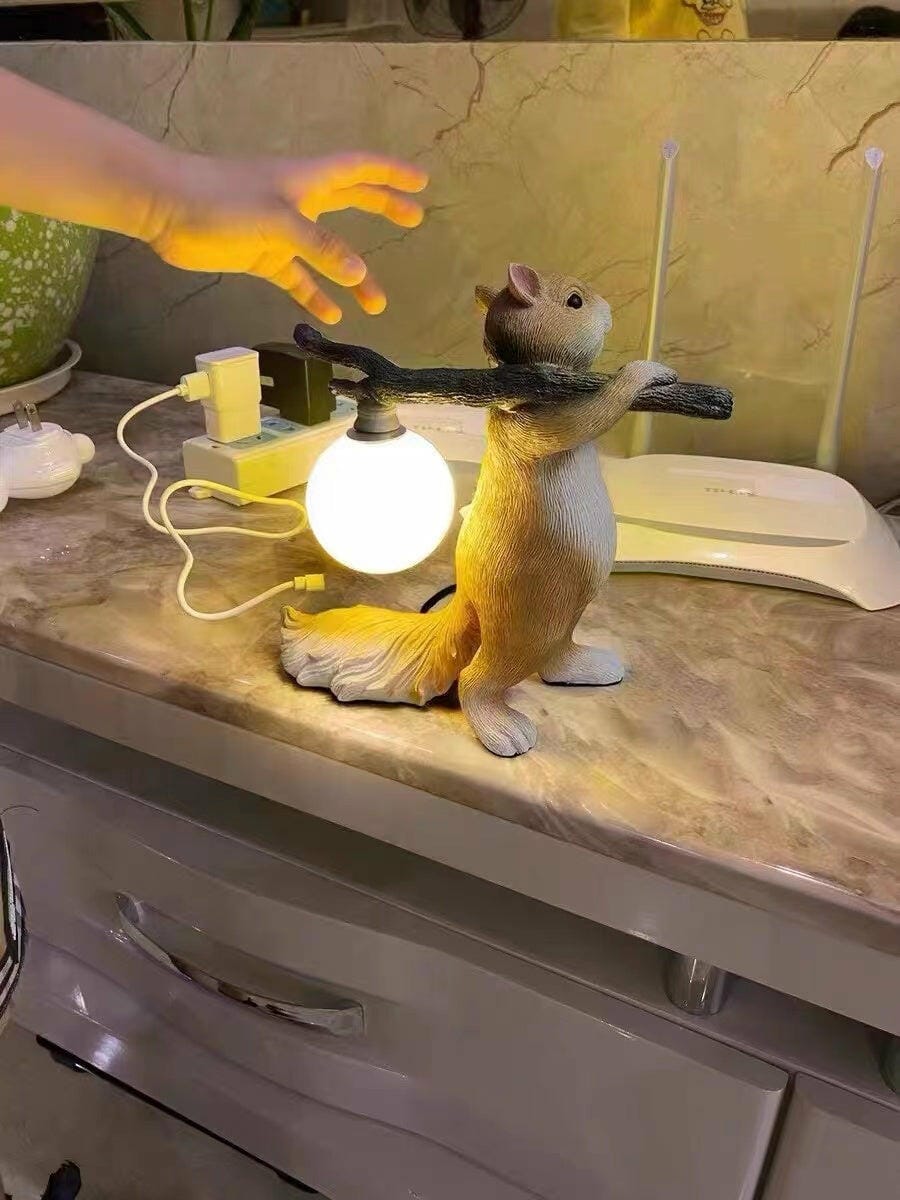 Customer photo review of Table Lamp, Cast Resin Squirrel Holding Glass Globe, 25 cm
