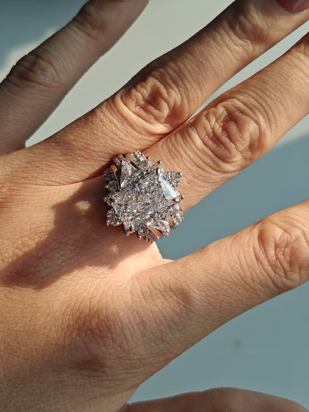 Customer photo review of 5.0Ct Radiant Cut Wedding Ring Set Gold Plated Side Stone Engagement Rings With Pavé Jacket Wedding Band