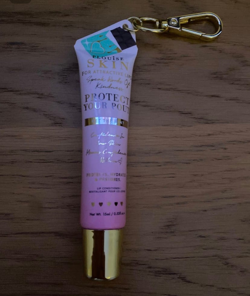 Customer photo review of Protect Your Pout Keychain Lip Conditioner