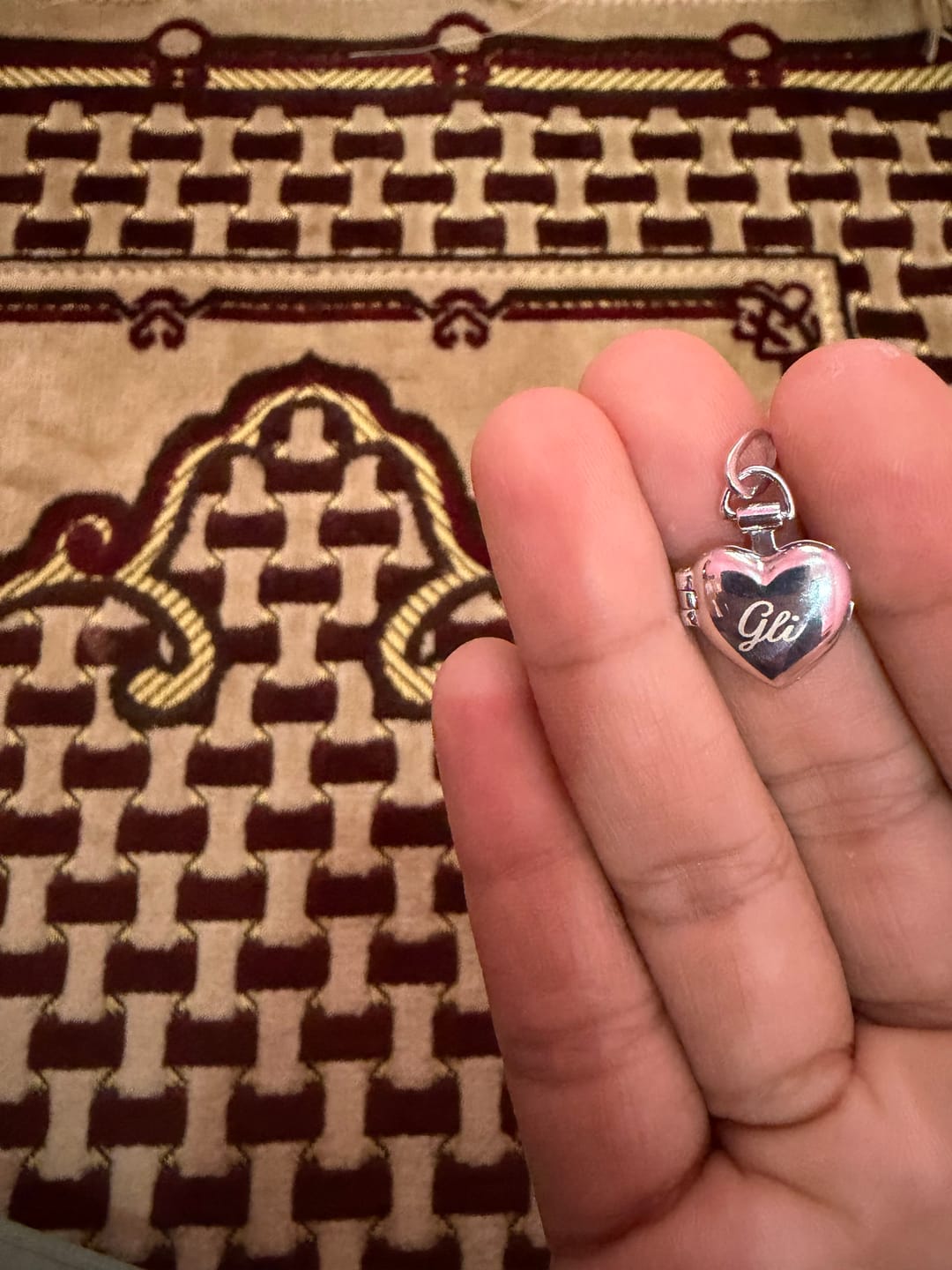 Customer photo review of Memento Sacred Heart Locket Necklace