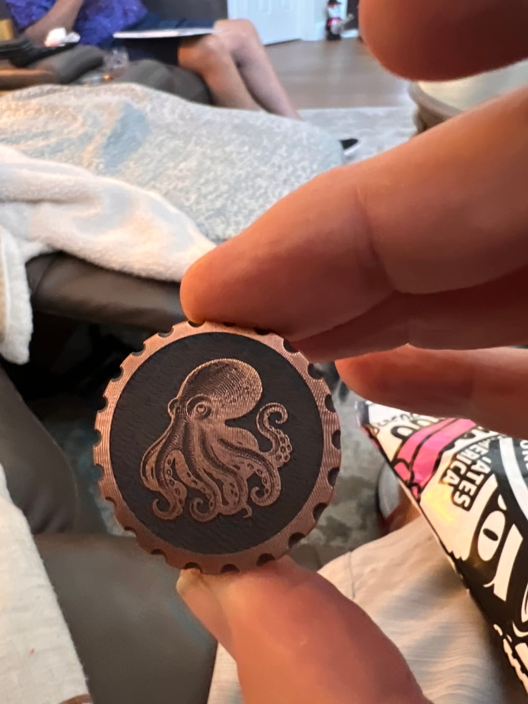 Customer photo review of The Octopus Coin — Copper